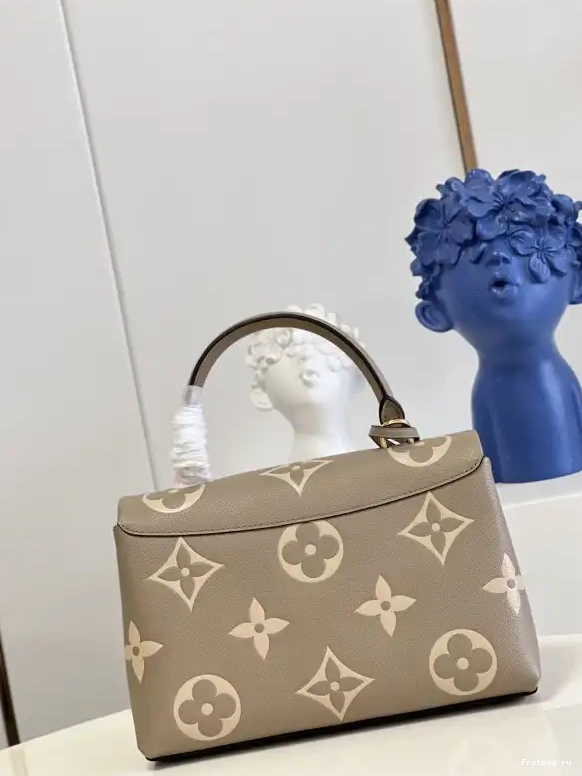 First bag ru VUITTON LOUIS MM MADELEINE 0514